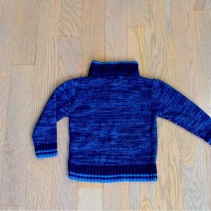 blue polo boy's sweater